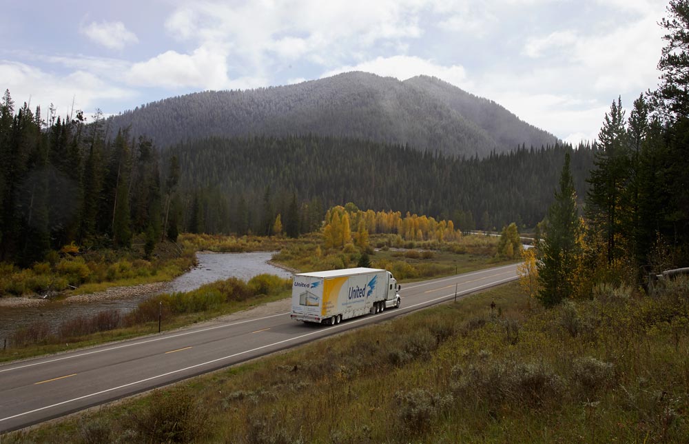 A moving company car doing interstate move