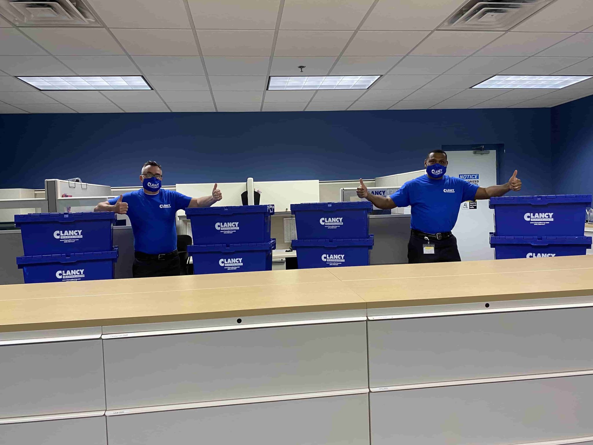 men working on moving commercial stuff