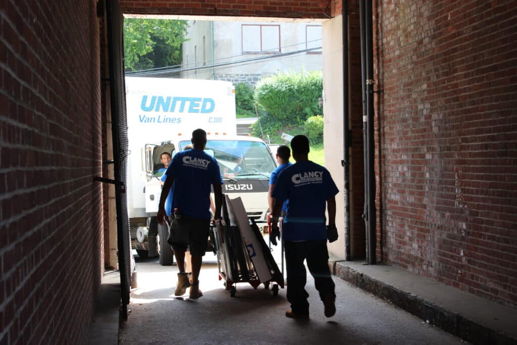 Clancy Relocation & Logistics is using the building facilities correctly when transporting.