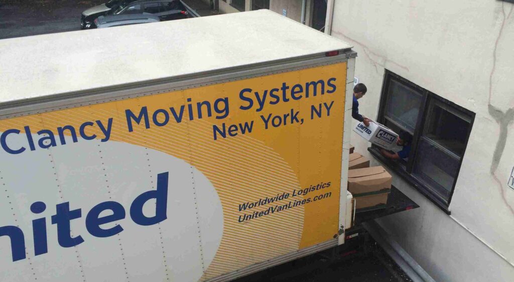 safely loading the items to the moving truck